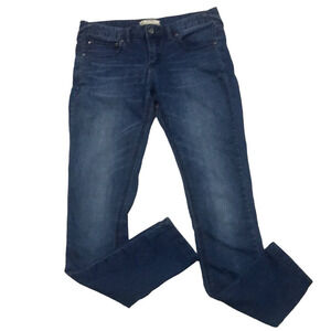 Free People mid-rise skinny Medium Wash with intensional fading, wiskering sz 28